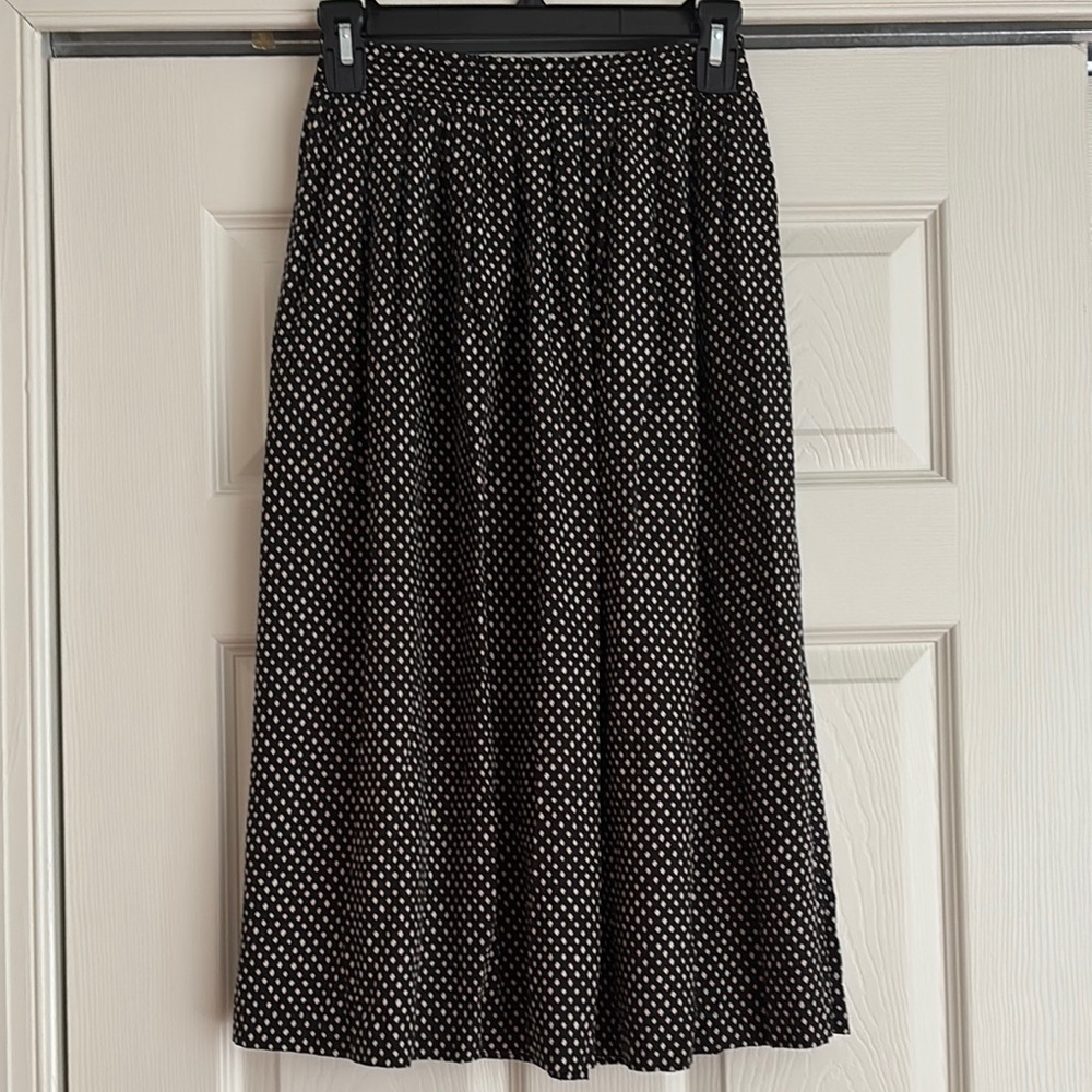 Vintage black and beige print rayon skirt in size 4 (equivalent to an XS today)
